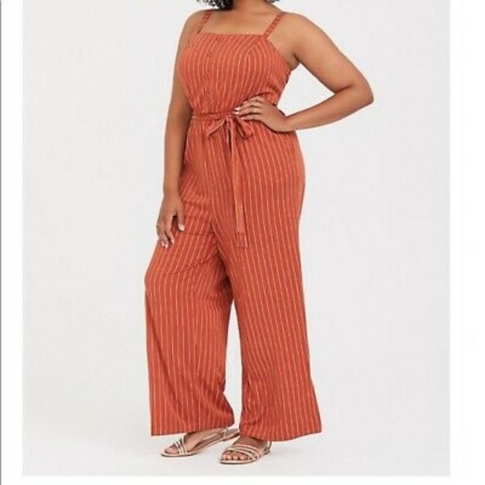Torrid 2X spaghetti strap rust orange striped jump suit with pockets.